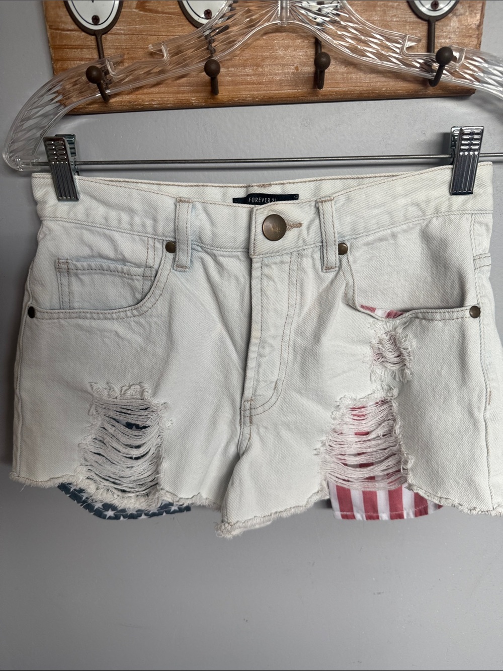 Forever 21 American Flag Pockets Shorts in Distressed Denim.  Size 26.